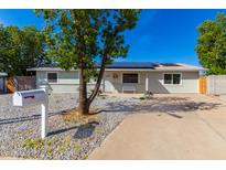 House exterior with solar panels and landscaping at 17627 N 14Th Ave, Phoenix, AZ 85023