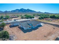 Aerial view showcasing a new construction home's rear elevation, highlighting its design and landscape at 26761 S 181St Pl, Queen Creek, AZ 85142
