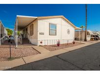 Front view of the manufactured home with landscaping at 205 S Higley Rd # 200, Mesa, AZ 85206