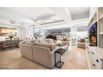 Open living area with ample seating and access to patio at 7117 E Rancho Vista Dr # 4011, Scottsdale, AZ 85251