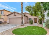 Charming one-story house with a well-maintained lawn at 30200 N Desert Willow Blvd, San Tan Valley, AZ 85143