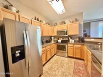 Well-equipped kitchen with stainless steel appliances at 20100 N 78Th Pl # 3090, Scottsdale, AZ 85255