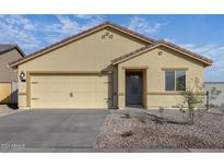 Single-story house with two-car garage at 611 W Pintail Dr, Casa Grande, AZ 85122