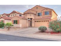 Beautiful two-story house with a large driveway and landscaped yard at 20772 N Dries Rd, Maricopa, AZ 85138