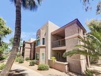 Two-story building exterior with balconies and landscaping at 17017 N 12Th St # 2124, Phoenix, AZ 85022