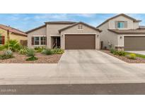 Modern single story home with drought tolerant landscaping at 6709 W Pleasant Oak Ct, Florence, AZ 85132