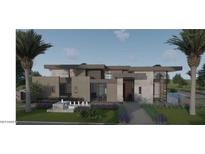 Modern home exterior with a sleek design and landscaping at 6879 E Palma Vita Dr, Paradise Valley, AZ 85253