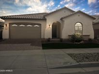 Charming one-story home with landscaped yard at 15963 W Montana De Oro Dr, Surprise, AZ 85387