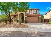 Two-story house with a large garage and desert landscaping at 3386 W Hemingway Ln, Anthem, AZ 85086