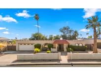 Single story home with a charming exterior at 7012 N 22Nd St, Phoenix, AZ 85020