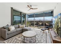Modern living room with city views and comfortable seating at 7180 E Kierland Blvd # 509, Scottsdale, AZ 85254