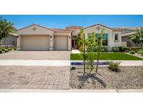 Beautiful two-car garage home with landscaped yard at 9649 E Solina Ave, Mesa, AZ 85212