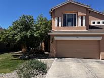 Two-story home with a large three car garage at 968 S Western Skies Dr, Gilbert, AZ 85296