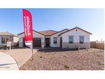 One-story home with a tile roof and attached garage at 23997 N 172Nd Ave, Surprise, AZ 85387