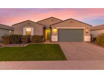 One-story home with a two-car garage and landscaped front yard at 4156 E Nokota Rd, San Tan Valley, AZ 85140