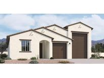 Two-story home with a modern design, two-car garage, and desert landscaping at 2690 E Abe Truckle Ave, San Tan Valley, AZ 85140