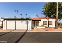 Spanish style home exterior with a two-car garage at 6501 N Villa Manana Dr, Phoenix, AZ 85014