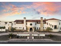 Stunning two-story home with a grand facade and landscaped grounds at 21868 E Stacey Rd, Queen Creek, AZ 85142