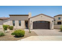 Charming house exterior with a single-car garage and manicured landscaping at 156 E Leverenz Ave, San Tan Valley, AZ 85140