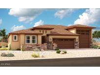 Attractive single-story home with a three-car garage at 19561 E Estrella Rd, Queen Creek, AZ 85142