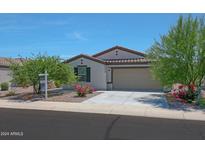 Charming one-story home with landscaping at 25565 W Gwen St, Buckeye, AZ 85326