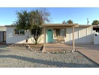 Charming single story home with a covered porch at 2057 E Howe Ave, Tempe, AZ 85281