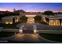 Luxury estate home with circular driveway and gated entry at 40 Biltmore Est, Phoenix, AZ 85016