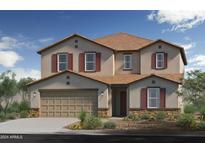 Two-story house with a three-car garage at 27909 N 171St Dr, Surprise, AZ 85387
