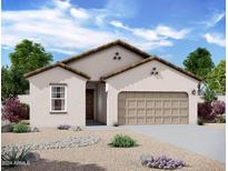 New construction home with tan exterior, tile roof and two-car garage at 13213 E Larrea Ln, Florence, AZ 85132