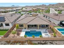 Aerial view of house with pool and landscaping at 15175 S 185Th Ave, Goodyear, AZ 85338