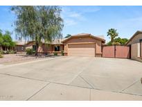 House exterior with driveway, garage, and gate at 4924 W Boston St, Chandler, AZ 85226