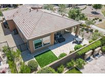 Aerial view showcasing backyard patio and artificial turf at 90 E Leverenz Ave, Queen Creek, AZ 85140