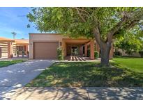 House exterior with carport and landscaped lawn at 292 Leisure World --, Mesa, AZ 85206