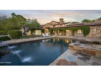 Luxury estate with pool, spa, and patio area at 19452 N 98Th Pl, Scottsdale, AZ 85255