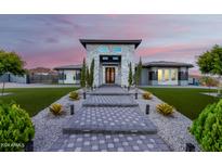 Stunning curb appeal with a landscaped front yard at 12 E Quartz Rock Rd, Phoenix, AZ 85085