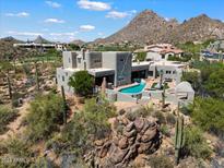 Desert home with pool and mountain backdrop at 23832 N 112Th Pl, Scottsdale, AZ 85255