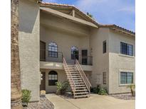 Two story condo building with stairway access to unit at 930 N Mesa Dr # 2037, Mesa, AZ 85201