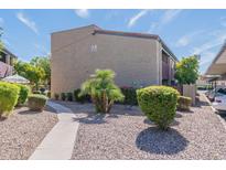 Building exterior with walkway and landscaping at 1730 W Emelita Ave # 2014, Mesa, AZ 85202