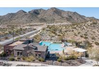Community pool and recreation area with mountain views at 2738 N 217Th Ave, Buckeye, AZ 85396