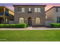 Two story home with attractive landscaping and curb appeal at 3832 E Leslie Dr, Gilbert, AZ 85296