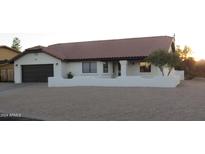 Single story home with a terracotta tile roof and a low wall at 15240 N Bahia Blvd, Fountain Hills, AZ 85268