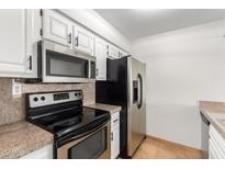 Kitchen features stainless steel appliances at 7625 E Camelback Rd # A418, Scottsdale, AZ 85251