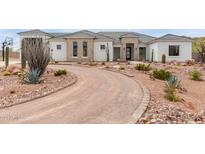 Modern home exterior with desert landscaping and driveway at 267 W Amherst St, San Tan Valley, AZ 85143