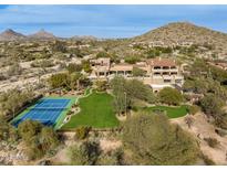 Luxury estate with tennis court and mountain views at 23036 N Via Ventosa Dr, Scottsdale, AZ 85255