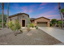 Beautiful home exterior with stone and stucco accents at 28352 N 124Th Dr, Peoria, AZ 85383