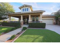 House exterior with a covered front porch and landscaping at 20377 W Terrace Ln, Buckeye, AZ 85396