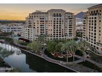 High rise building with water views at sunset at 7175 E Camelback Rd # 202, Scottsdale, AZ 85251