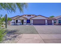 Single-story home with two-car garage and desert landscaping at 35925 N 30Th Dr, Phoenix, AZ 85086