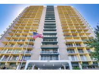 High-rise building with many balconies and an American flag at 207 W Clarendon Ave # 20B, Phoenix, AZ 85013