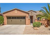 Charming one-story home with a two-car garage and well-maintained landscaping at 26723 N 127Th Dr, Peoria, AZ 85383